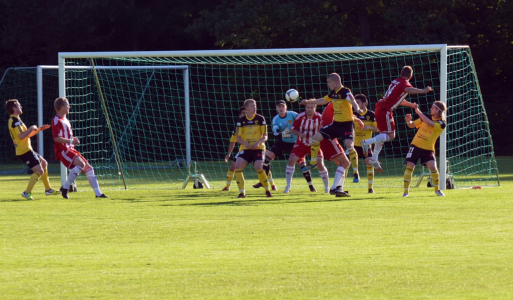 2012_0620_05.JPG - En ny Salahörna och Gustav Gustavsson försöker sparka undan bollen. . . .