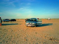 15  En biltur på stranden